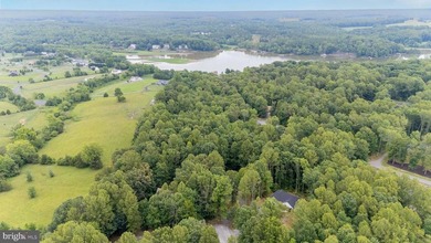 This 2.5 acre wooded property a gem! Enjoy this water access lot - photo 3