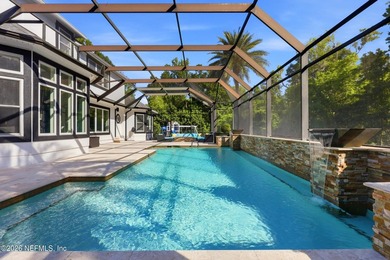 **$60,000 price improvement!!** Discover an elevated standard of - photo 2