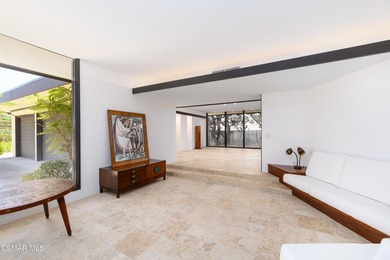 Enjoy expansive views from floor to ceiling windows in every - photo 23