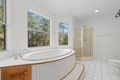 This exceptional waterfront home features 4 bedrooms and 4 - photo 23