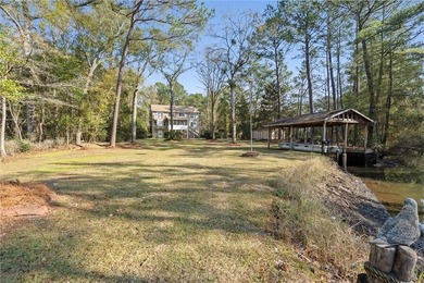 This exceptional waterfront home features 4 bedrooms and 4 - photo 32