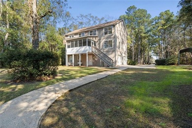 This exceptional waterfront home features 4 bedrooms and 4 - photo 35