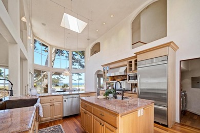 Ocean and golf course views take center stage in this - photo 6