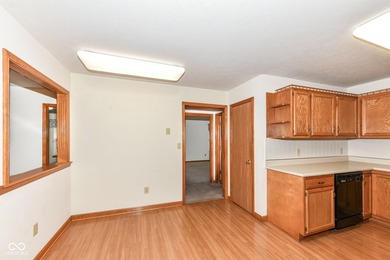 Inviting 2 bedroom, 2 bath patio home with den/sunroom located