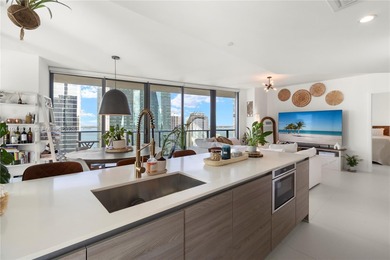 Bright & Spacious 2 bedroom + Den corner unit located in the