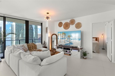 Bright & Spacious 2 bedroom + Den corner unit located in the