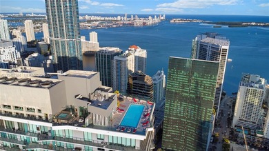 Bright & Spacious 2 bedroom + Den corner unit located in the