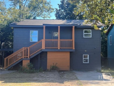 Discover this versatile duplex offering two separate units - photo 1