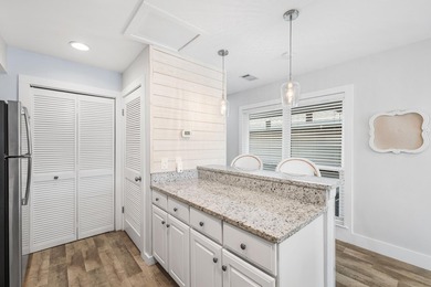 Coveted top-floor corner unit on the Links Golf Course with - photo 11