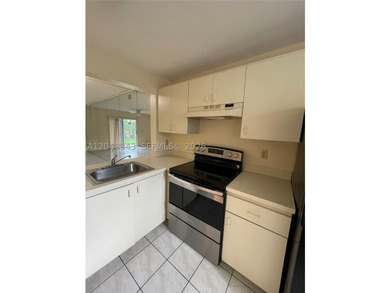 Updated and spacious 2-bedroom, 2-bathroom first-floor unit in - photo 8