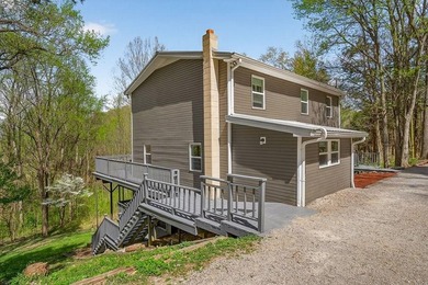 Tucked away on a private dead-end street, this stunning home - photo 1