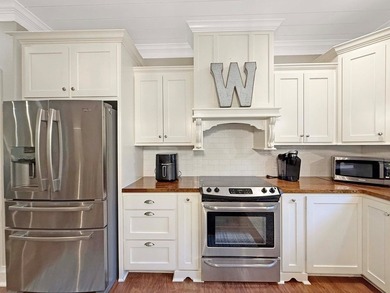 Enjoy the Rayburn Country lifestyle in this beautiful partially - photo 12