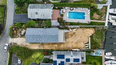 OPPORTUNITY TO CREATE YOUR DREAM WATERFRONT HOME IN THE VILLAGE - photo 3