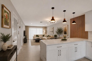 RENOVATED, MOVE-IN READY VILLA. Experience effortless Florida - photo 1