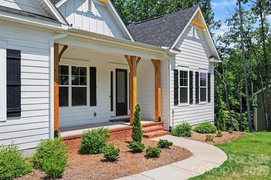 Move-in ready new construction in the gated lakefront community - photo 13