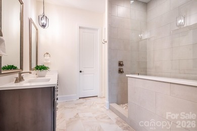 Move-in ready new construction in the gated lakefront community - photo 21