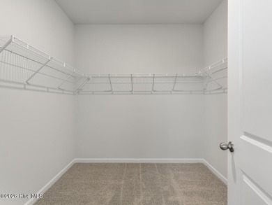''The Darby floor plan features an open-concept layout with a - photo 22