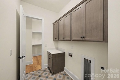 Move-in ready new construction in the gated lakefront community - photo 31