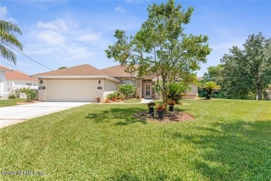 Welcome to your exclusive Palm Coast waterfront sanctuary. The - photo 1