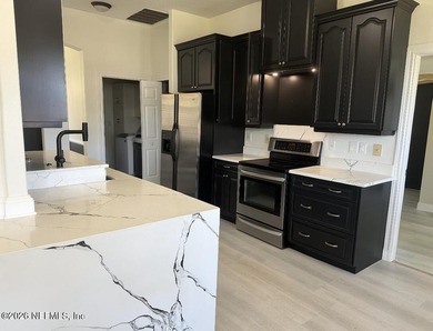 Welcome to your exclusive Palm Coast waterfront sanctuary. The - photo 8