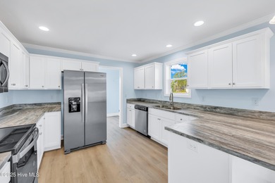 Discover simple coastal living at 936 Willow Place SW. This - photo 5