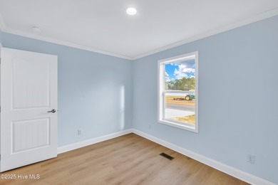 Discover simple coastal living at 936 Willow Place SW. This - photo 10