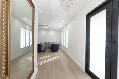 Tucked away on an oversized corner lot in the sought-after - photo 10