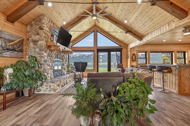 Set on 80 feet of deep-water shoreline along Lake Cascade, this - photo 11