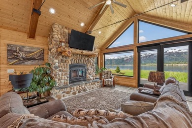 Set on 80 feet of deep-water shoreline along Lake Cascade, this - photo 12