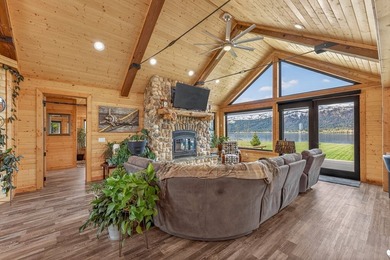 Set on 80 feet of deep-water shoreline along Lake Cascade, this - photo 15
