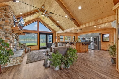 Set on 80 feet of deep-water shoreline along Lake Cascade, this - photo 16