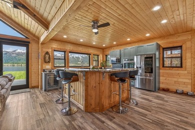 Set on 80 feet of deep-water shoreline along Lake Cascade, this - photo 17