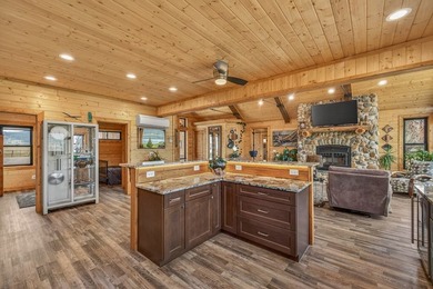 Set on 80 feet of deep-water shoreline along Lake Cascade, this - photo 19