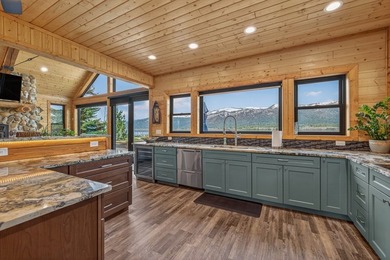 Set on 80 feet of deep-water shoreline along Lake Cascade, this - photo 20