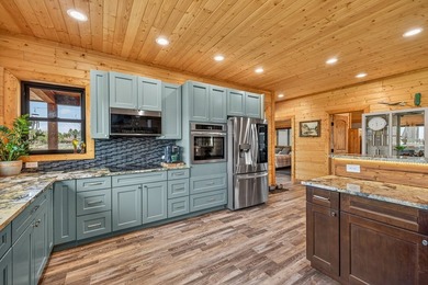 Set on 80 feet of deep-water shoreline along Lake Cascade, this - photo 22