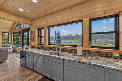 Set on 80 feet of deep-water shoreline along Lake Cascade, this - photo 23