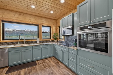 Set on 80 feet of deep-water shoreline along Lake Cascade, this - photo 24