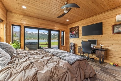 Set on 80 feet of deep-water shoreline along Lake Cascade, this - photo 27