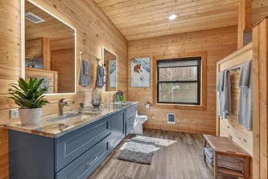 Set on 80 feet of deep-water shoreline along Lake Cascade, this - photo 28