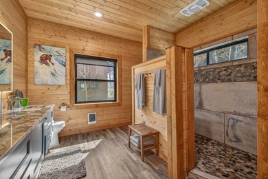Set on 80 feet of deep-water shoreline along Lake Cascade, this - photo 29