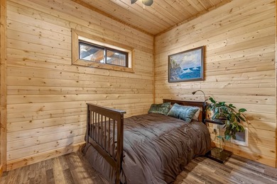 Set on 80 feet of deep-water shoreline along Lake Cascade, this - photo 32