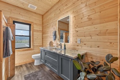 Set on 80 feet of deep-water shoreline along Lake Cascade, this - photo 34