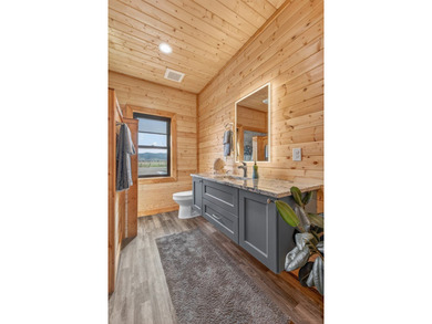 Set on 80 feet of deep-water shoreline along Lake Cascade, this - photo 35