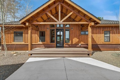 Set on 80 feet of deep-water shoreline along Lake Cascade, this - photo 41