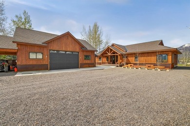 Set on 80 feet of deep-water shoreline along Lake Cascade, this - photo 46