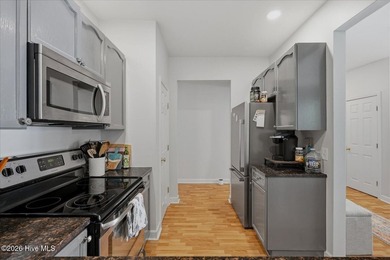 Beautiful 3-bedroom, 2-bath condo ideally located near the - photo 13