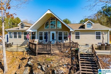 This one level lake front home offers 3 bedrooms and 2 full - photo 1