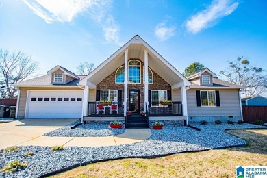 This one level lake front home offers 3 bedrooms and 2 full - photo 2