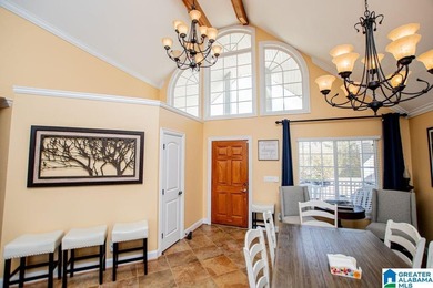 This one level lake front home offers 3 bedrooms and 2 full - photo 4