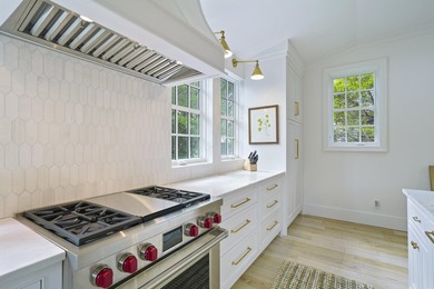 Designed by Robert Orr, this home is perfectly positioned on a - photo 24